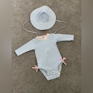 Ruffle butt seersucker baby girl rash guard and hat